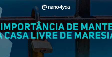 Cadeado enferrujado em portão exposto à maresia, representando os danos causados pela oxidação em áreas litorâneas.