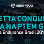 Carros de corrida na pista durante a Endurance Brasil 2019, com destaque para a vitória da equipe Ginetta na categoria P1.