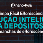 Parede de tijolos com manchas brancas de cal, ilustrando o problema de eflorescência em superfícies.