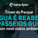 Banner institucional da nano4you com o texto “Túnel do Parque Tanguá é reaberto com passeios guiados e com novo status ambiental”, sobre imagem de um lago e passarela de madeira cercada por vegetação nativa.