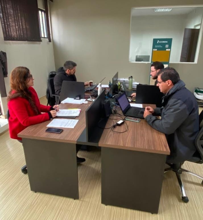 Foto da Reunião dos colaboradores no escritorio 